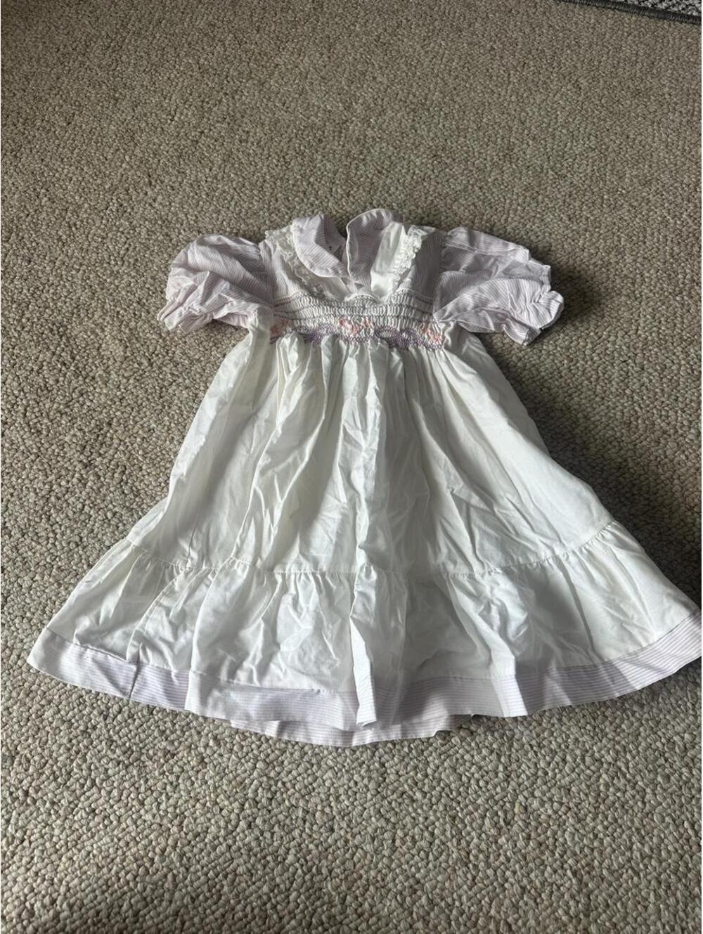Winnie the Pooh baby dress with purple and white stripes,